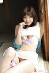 Japanese solo girl Juri Kitahara tentatively shows her trimmed pussy
