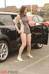 Shapely hot brunette Iga flashes a sexy panty upskirt in a car & in public