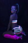 Glowing brunette Jada Stevens flaunts her sexy bubble butt under black light