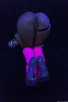 Glowing brunette Jada Stevens flaunts her sexy bubble butt under black light