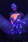 Glowing brunette Jada Stevens flaunts her sexy bubble butt under black light