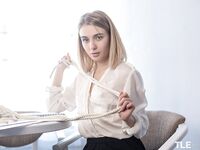 Tattooed teen Alice Shea rubs her naked pussy after adorning herself in rope