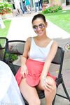 Braless beauty Olivia flashes her boobs and hot panties in a crowded place
