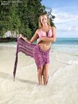 Horny blonde Bernice in bikini masturbating wet twat with dildo on beach