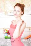 Cute redhead Ole uncovers big natural tits before showcasing her bald twat