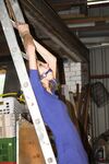 Amateur blonde Irena gagged & tied fully clothed to a ladder for garage grope