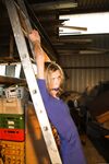 Amateur blonde Irena gagged & tied fully clothed to a ladder for garage grope
