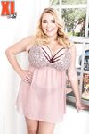 Blonde BBW Annabelle Rogers plays with her massive boobs in solo action