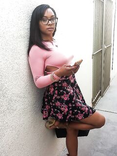 Busty black girl Porsha Carrera bends over in high heels for upskirt