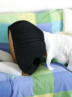 Blonde schoolgirl Francesca strips to pink underwear and teases on a couch