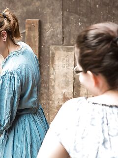 Horny housewives in glasses head outdoors to experiment with lesbian sex