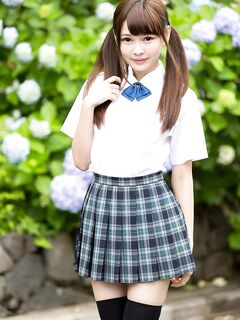 Cutie Japanese schoolgirl in pigtails shows naked ass in no panties upskirt