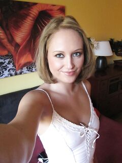 Middle-aged beauty removes her lingerie to set her perky boobs free