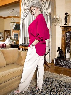 Granny pornstar Darla Crane stripping down to bra and underwear