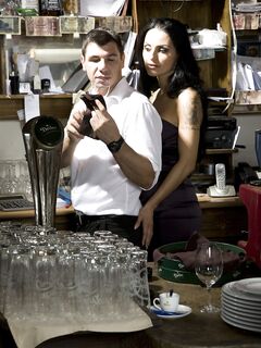 Hot MILFs get double fucked inside a restaurant by fully clothed waiters