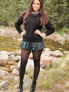 Hot babe in pantyhose Charley S flaunts her sexy big tits by the river