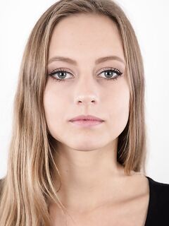 Tall teen Eliska stands totally naked while making her nude modeling debut