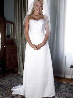 Blonde bride Katie Summers doffs her wedding dress & poses topless in lingerie