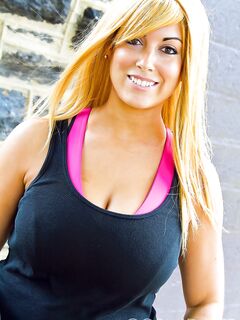 Brassy blonde fatty Tasha Cole removes shirt outside to pose in yoga pants