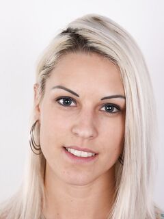 Platinum blonde amateur Beata reveals pussy piercing after getting undressed
