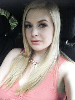 Big boobed amateur is joined by a girlfriend during one of her self shots