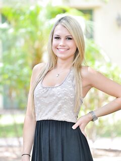 Cute blonde flashes black lace panties and ass outdoors before posing nude